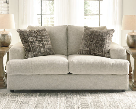 Close-up of Soletren loveseat chenille fabric and decorative pillow