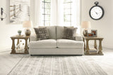 Soletren loveseat in living room setting with matching sofa
