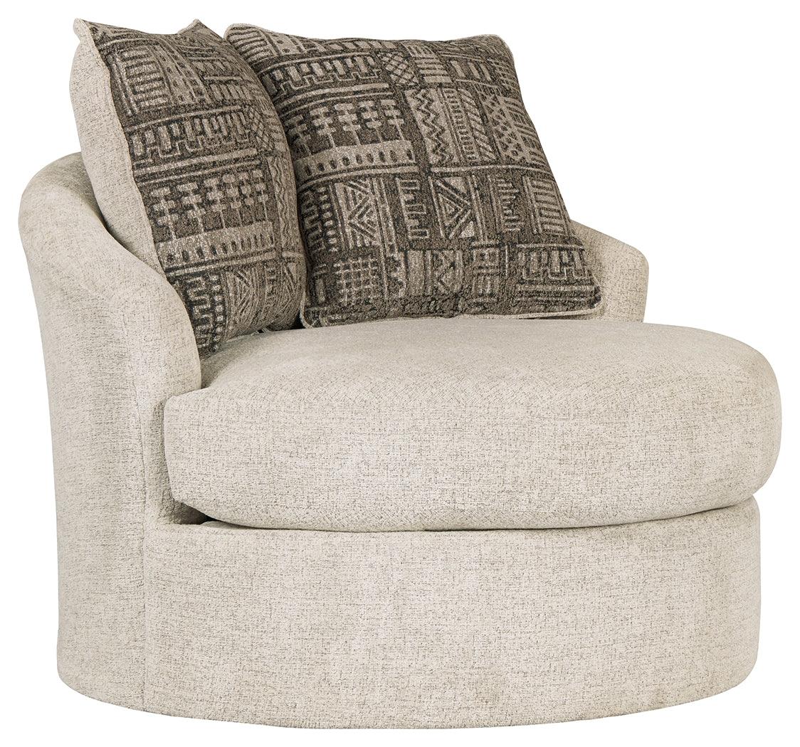 Side angle of Soletren Stone Chenille Swivel Accent Chair showing tufted back and rolled arms