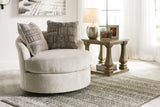 Soletren Stone Chenille Swivel Accent Chair showing exposed feet with faux wood finish