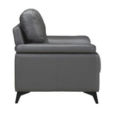 Angled side view of Mischa dark gray accent chair showing armrest