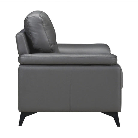 Angled side view of Mischa dark gray accent chair showing armrest
