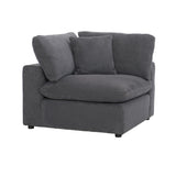 Angled view of gray love seat highlighting reversible cushions and wood frame