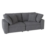 Side angle of gray microfiber upholstered love seat with pillows