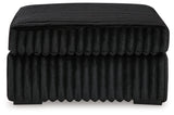 Midnight-Madness Ottoman angled view showing legs