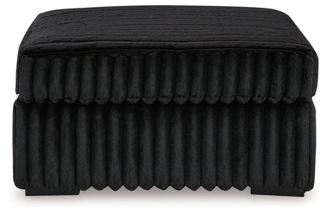 Midnight-Madness Ottoman angled view showing legs