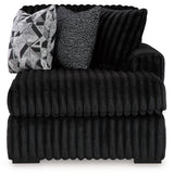 Side view of Midnight-Madness Onyx Velvet 3-Piece Sectional Sofa with Chaise