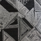Close-up side view of velvet pillow on Midnight-Madness sectional