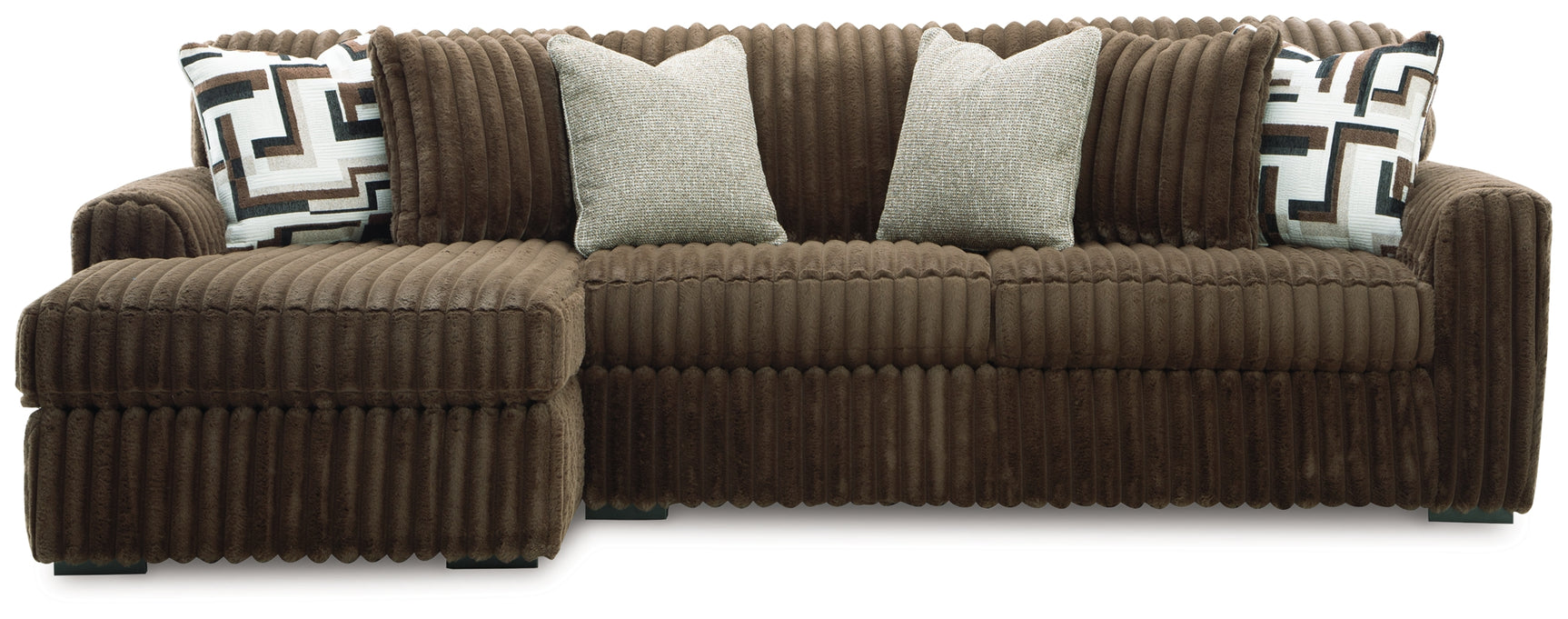 Detail of chocolate velvet upholstery on sectional sofa