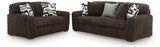 side view of Midnight Madness Chocolate Sofa and Loveseat furniture