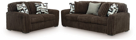 side view of Midnight Madness Chocolate Sofa and Loveseat furniture