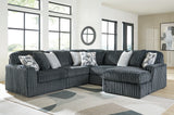 Room setting featuring Midnight-Madness 5-Piece Sectional with chaise
