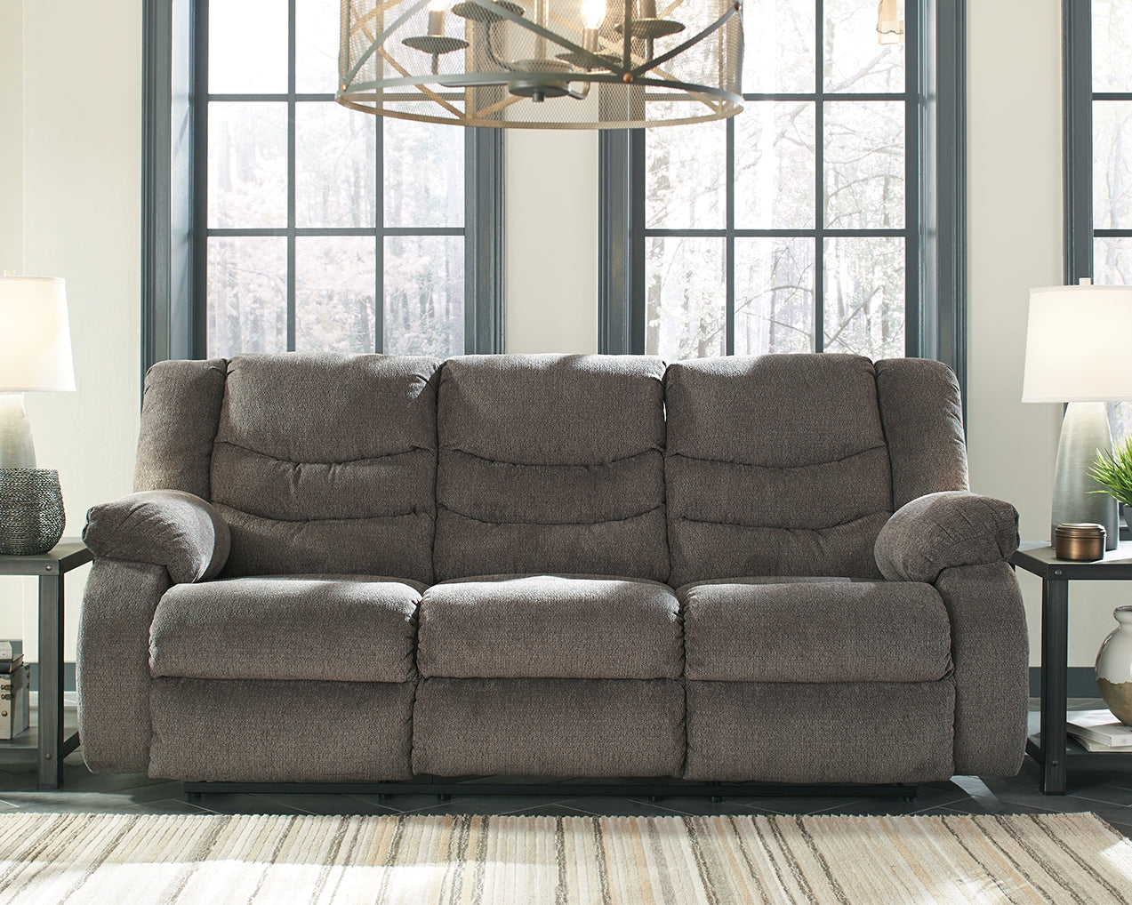 Close-up of Tulen Gray sofa pillow-top arm