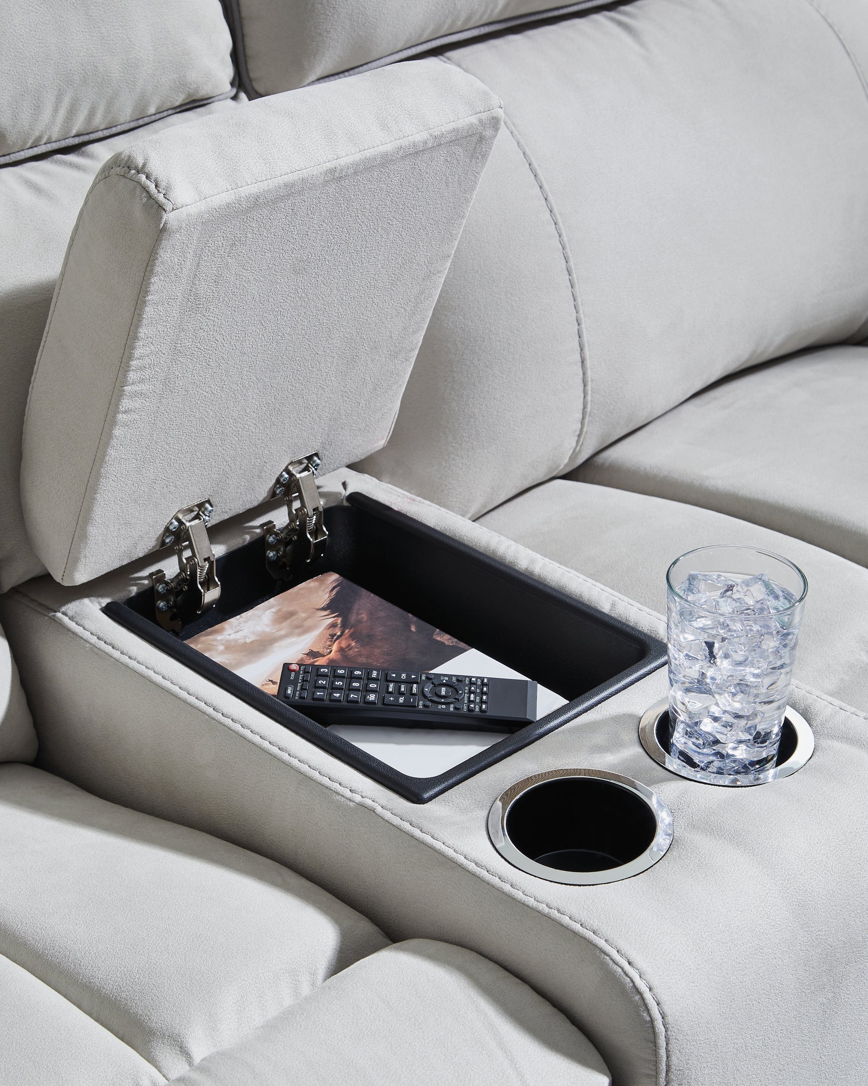 Console detail with cup holders on sectional sofa