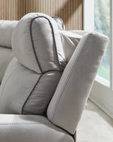 Back profile of sectional with bustle back cushions