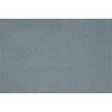 Close-up detail of tufted gray chenille fabric upholstery