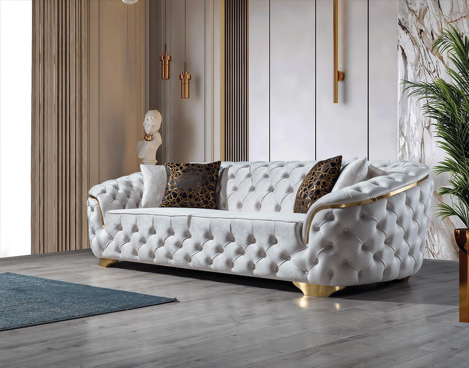 Close-up of sofa armrest with ivory velvet fabric