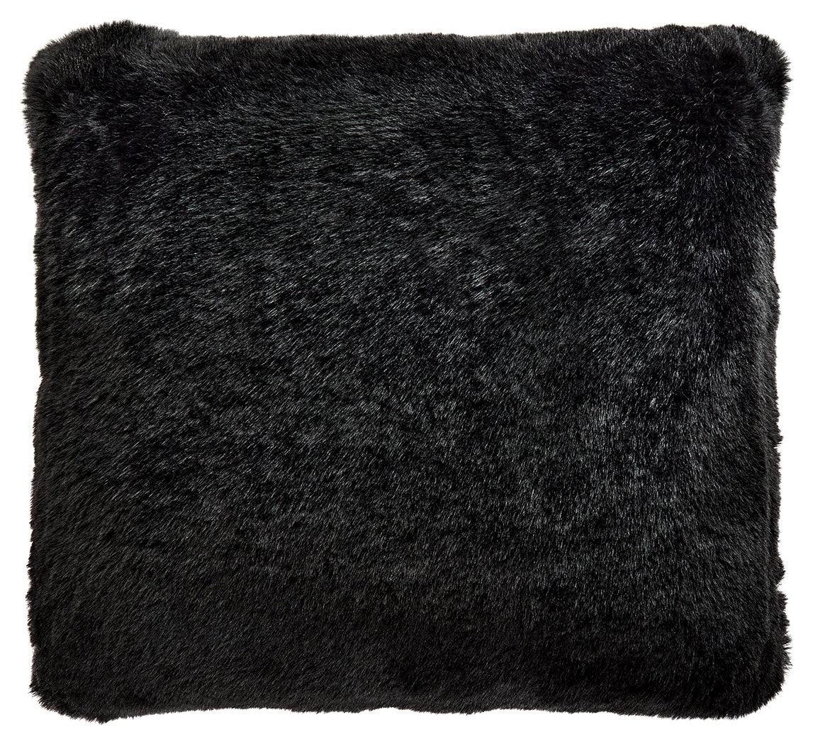 Side angle of Gariland Black Pillow showing plush faux fur face