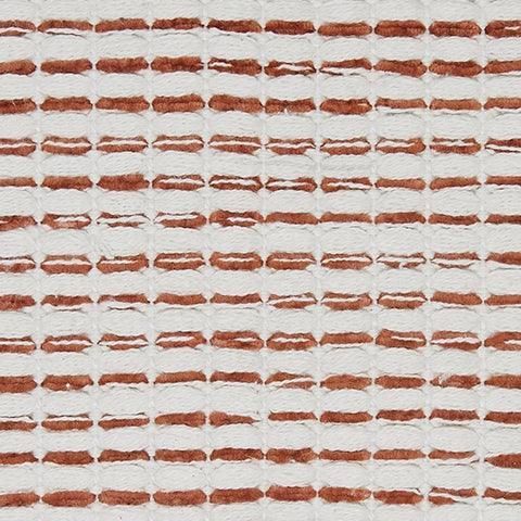 Nashlin fabric swatch showing white and rust stripes