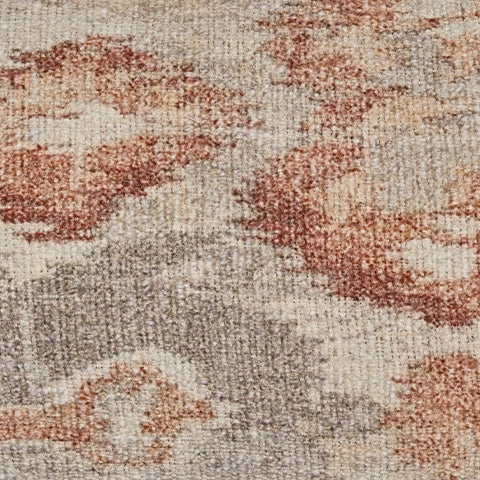 Aprover Pillow fabric swatch showing rust gray white colors