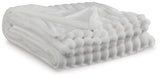 Alsonwell White Faux Fur Throw displayed flat