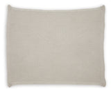 Close-up detail of Gayelery Sand Cotton Throw knitted fabric