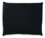 Close-up of black cotton throw texture and border edge