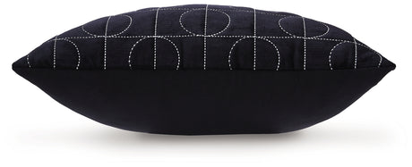 Back view showing solid black reverse of Kydner pillow