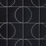 Fabric swatch showing black velvet and silver embroidery colors