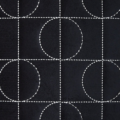 Fabric swatch showing black velvet and silver embroidery colors