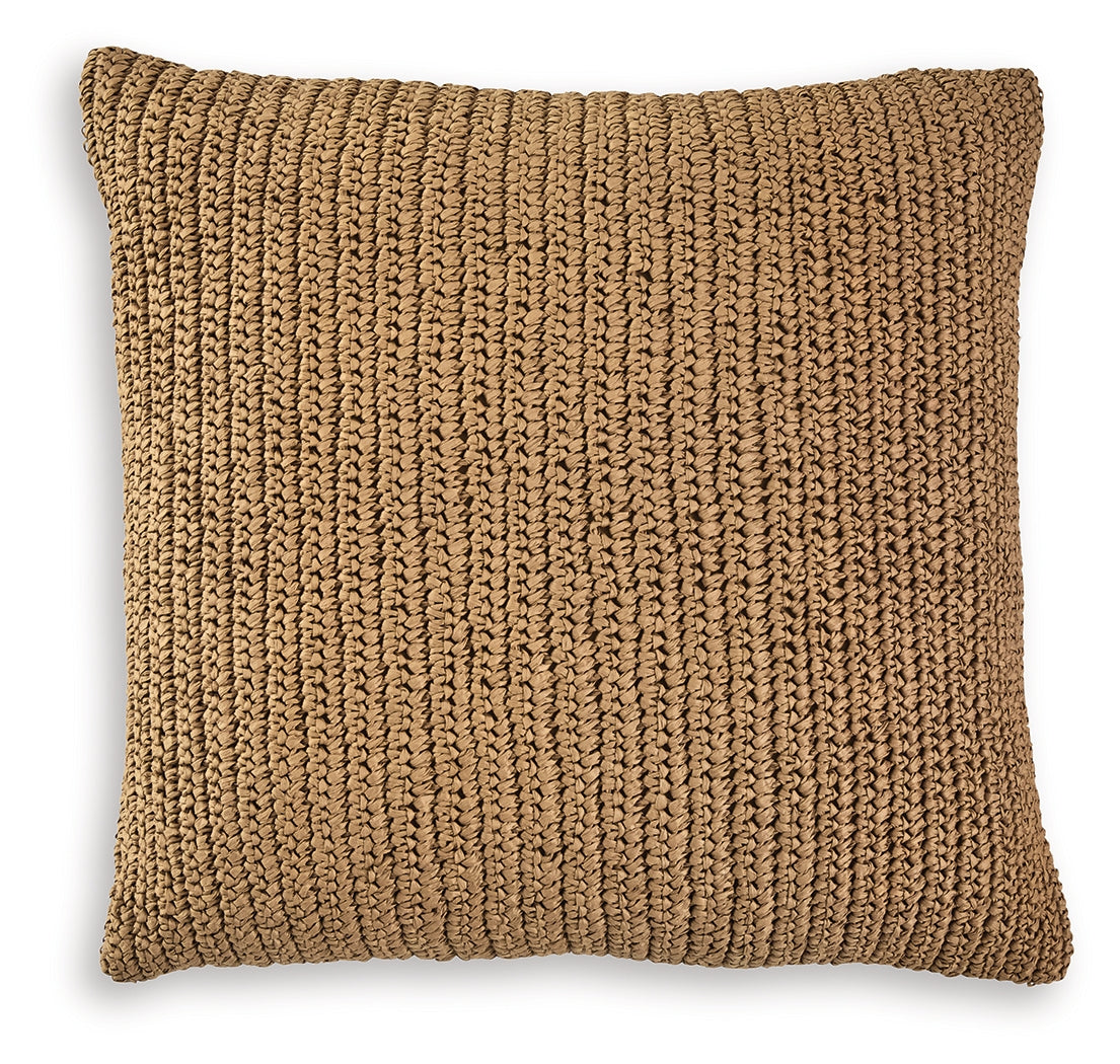 Close-up side view of Habenvale tan pillow with handwoven texture