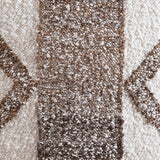 Fabric swatch showing ivory and brown colors