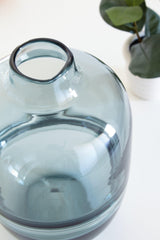 Close-up of glossy teal glass finish on Lemmitt vase
