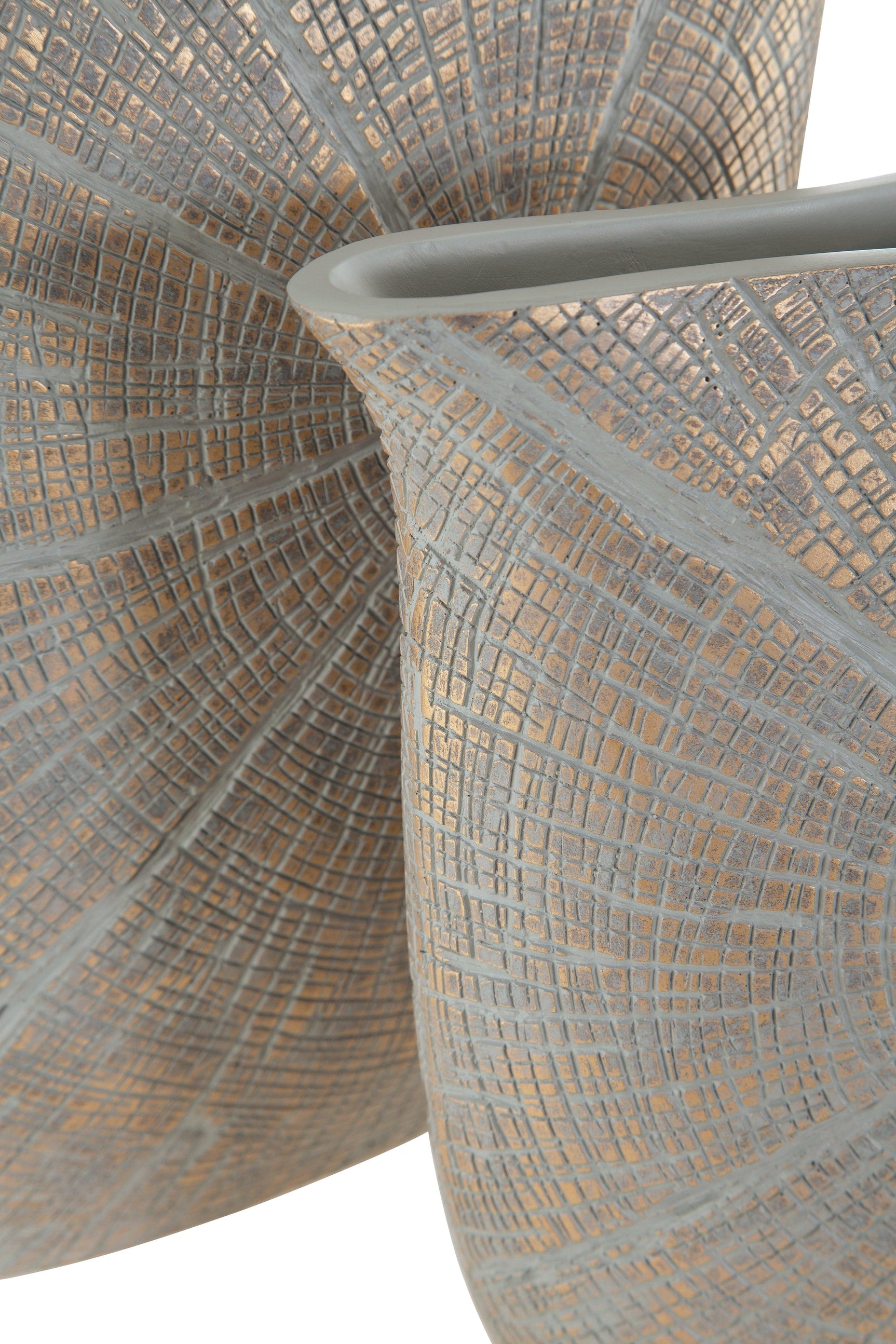 Close-up of starburst texture on Ardenley antique gold finish vase