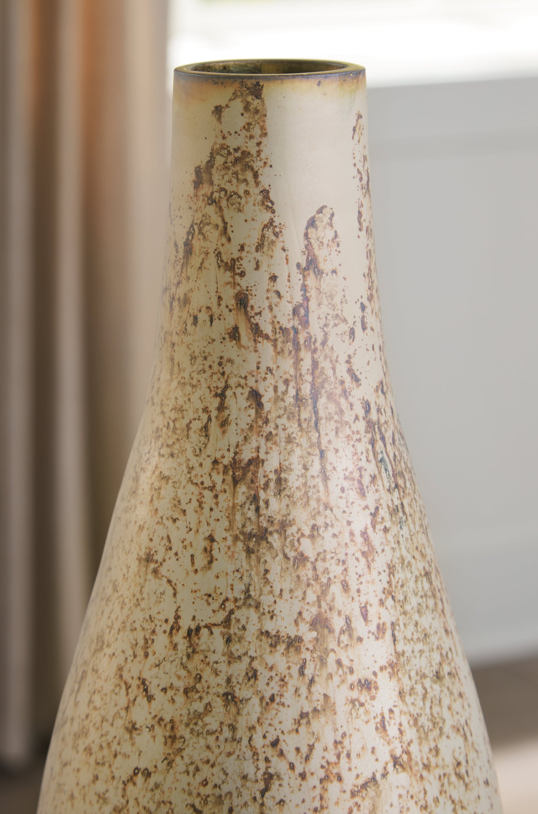 Detail showing finish variations on Plawite vase