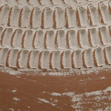 Textured distressed white finish detail of Reclove vase