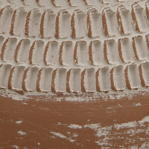 Textured distressed white finish detail of Reclove vase