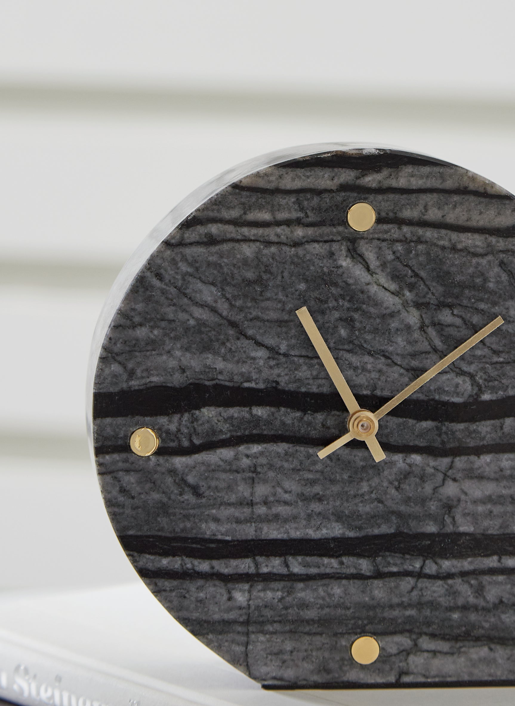 Close up of Janmour black marble table clock texture