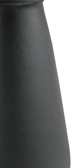 Full height view of vase on floor