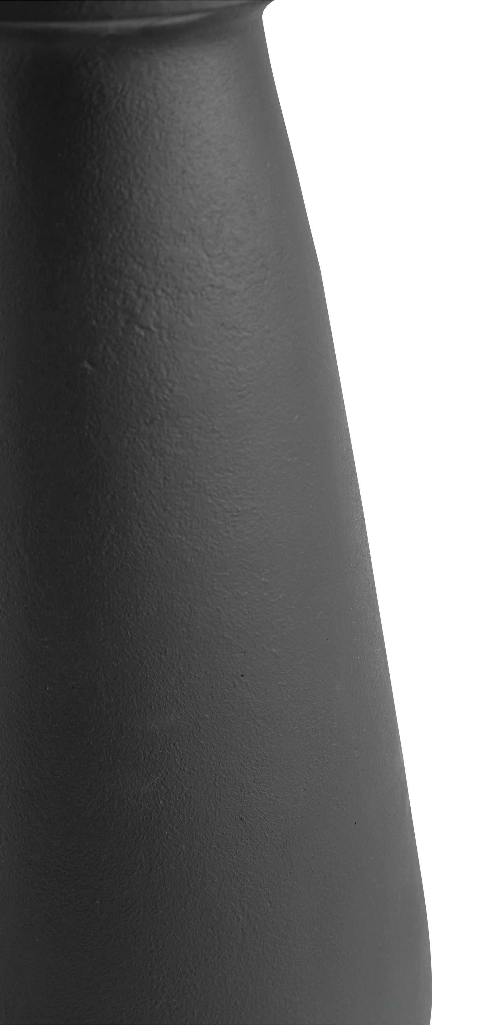 Full height view of vase on floor