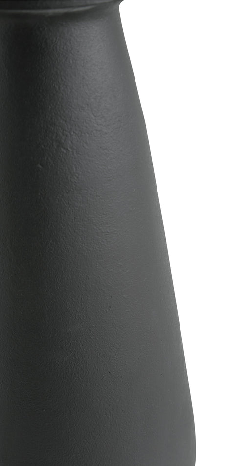 Full height view of vase on floor