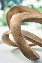 Finish detail of Dunnruck sculpture showing antique brass texture
