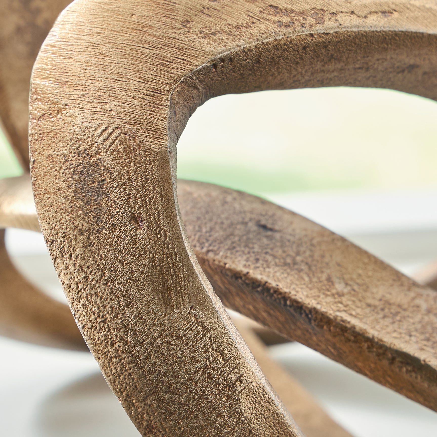 Dunnruck sculpture displayed on table in contemporary room