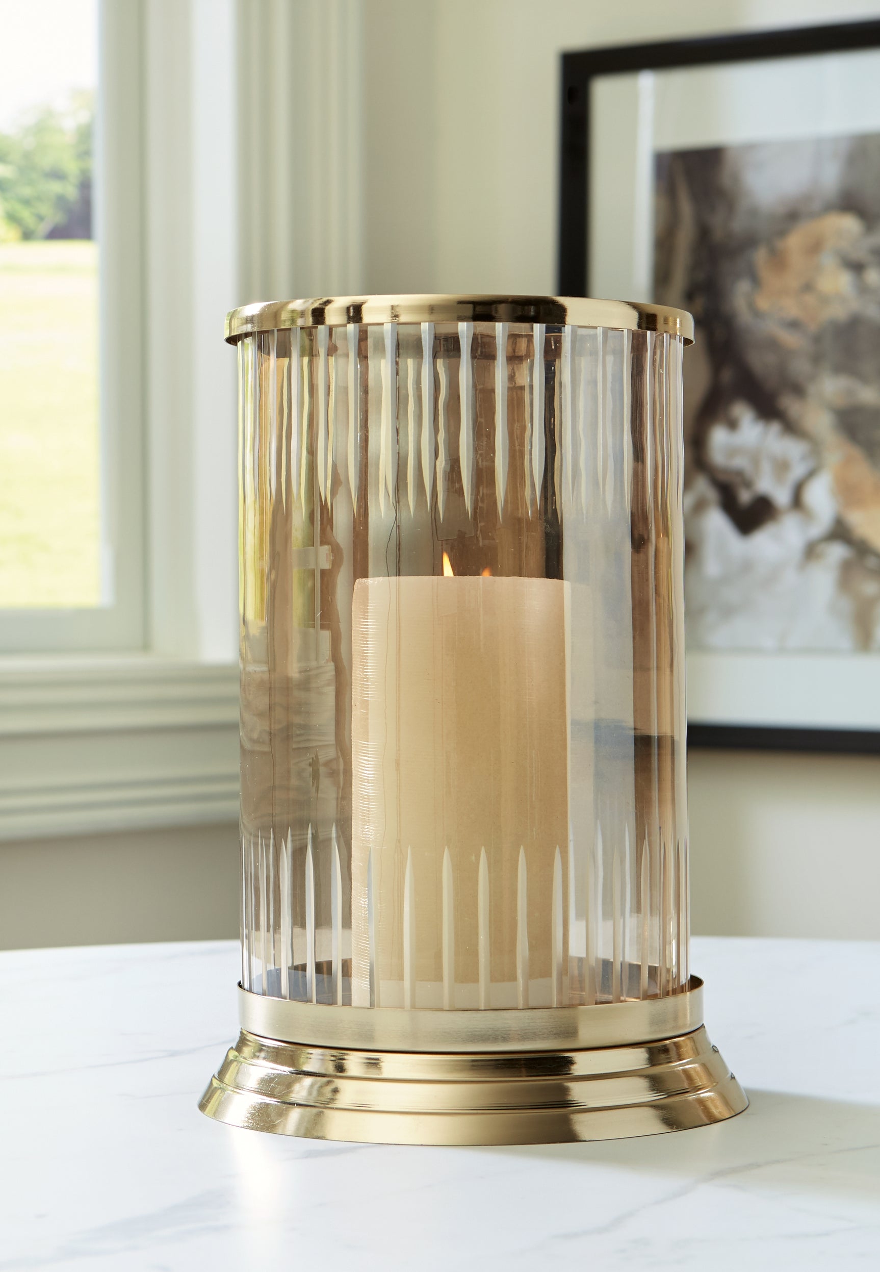 Aavinson Candle Holder lit with pillar candle