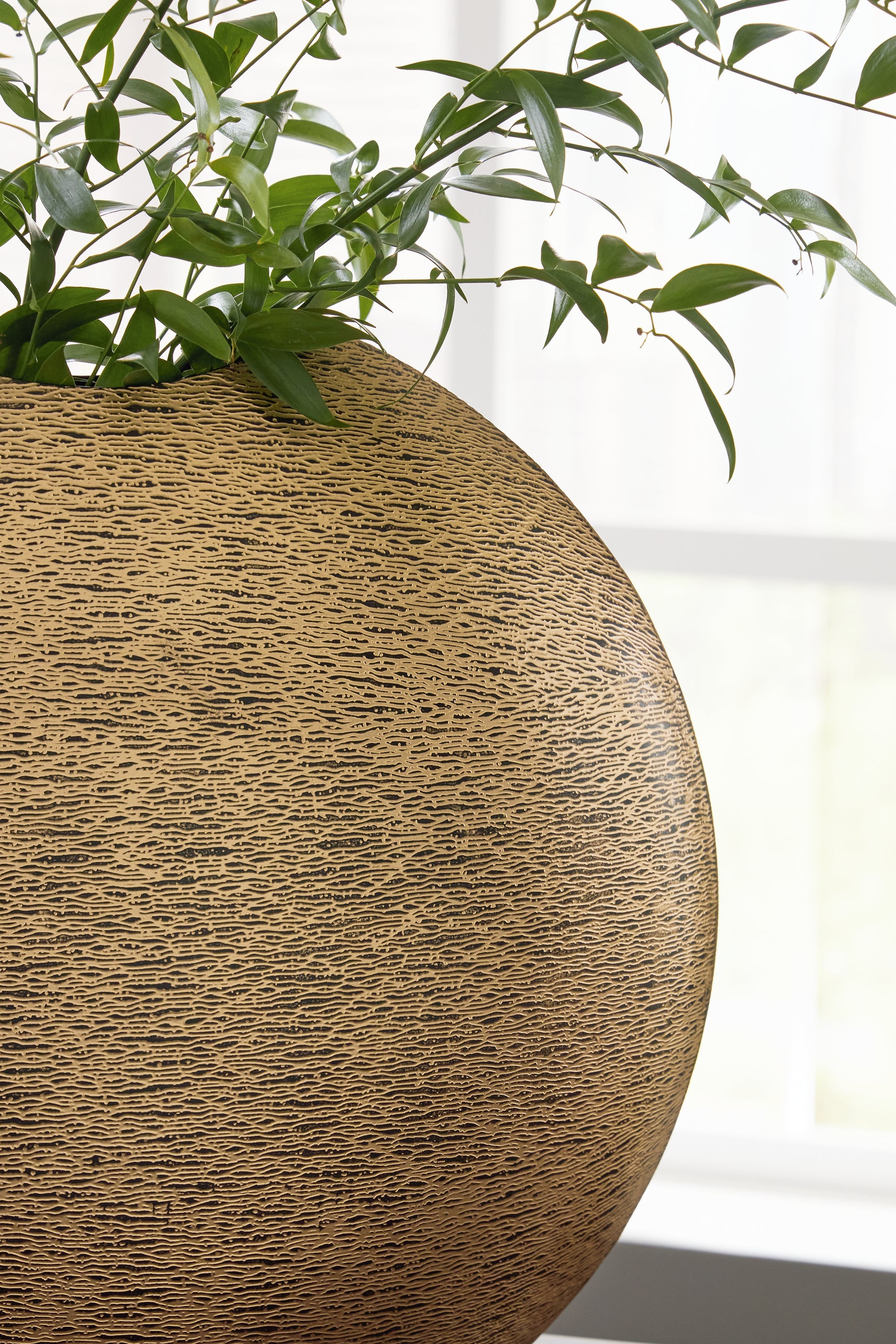 Detail of vase metal pattern and finish
