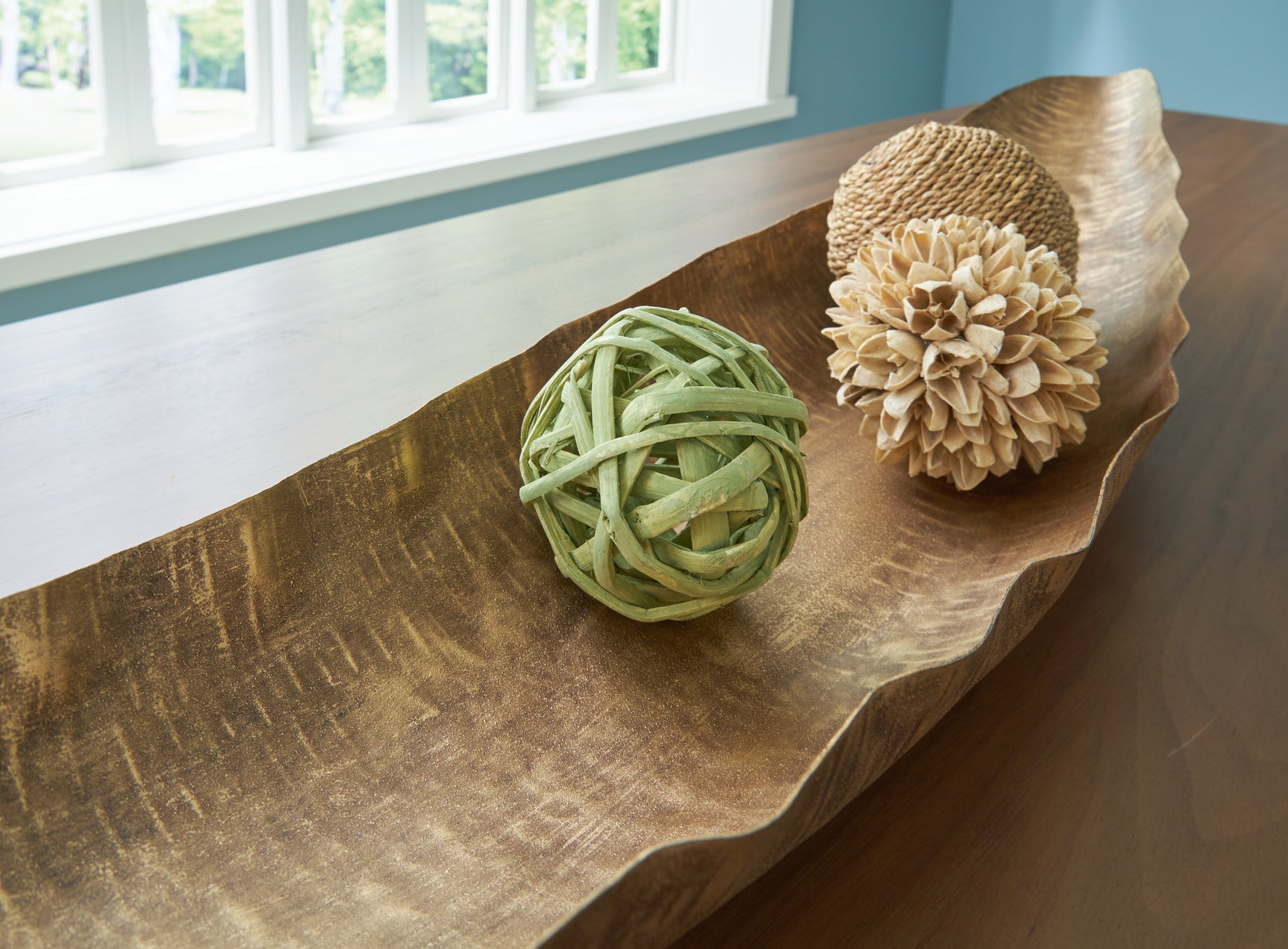 Close-up of handcrafted textured hammered metal finish on Wystenburg tray