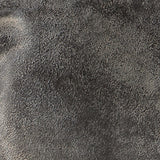 Close-up of the antiqued black finish and texture on Carnlow sculpture