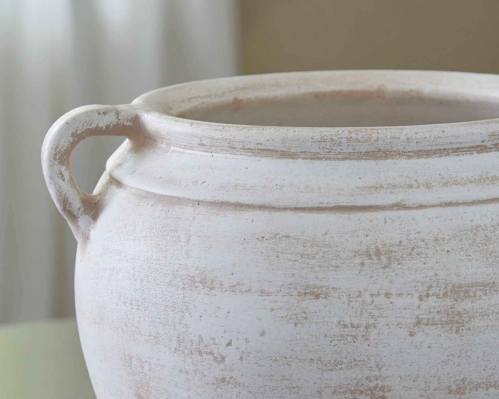 Detail of distressed white finish on Meadie vase