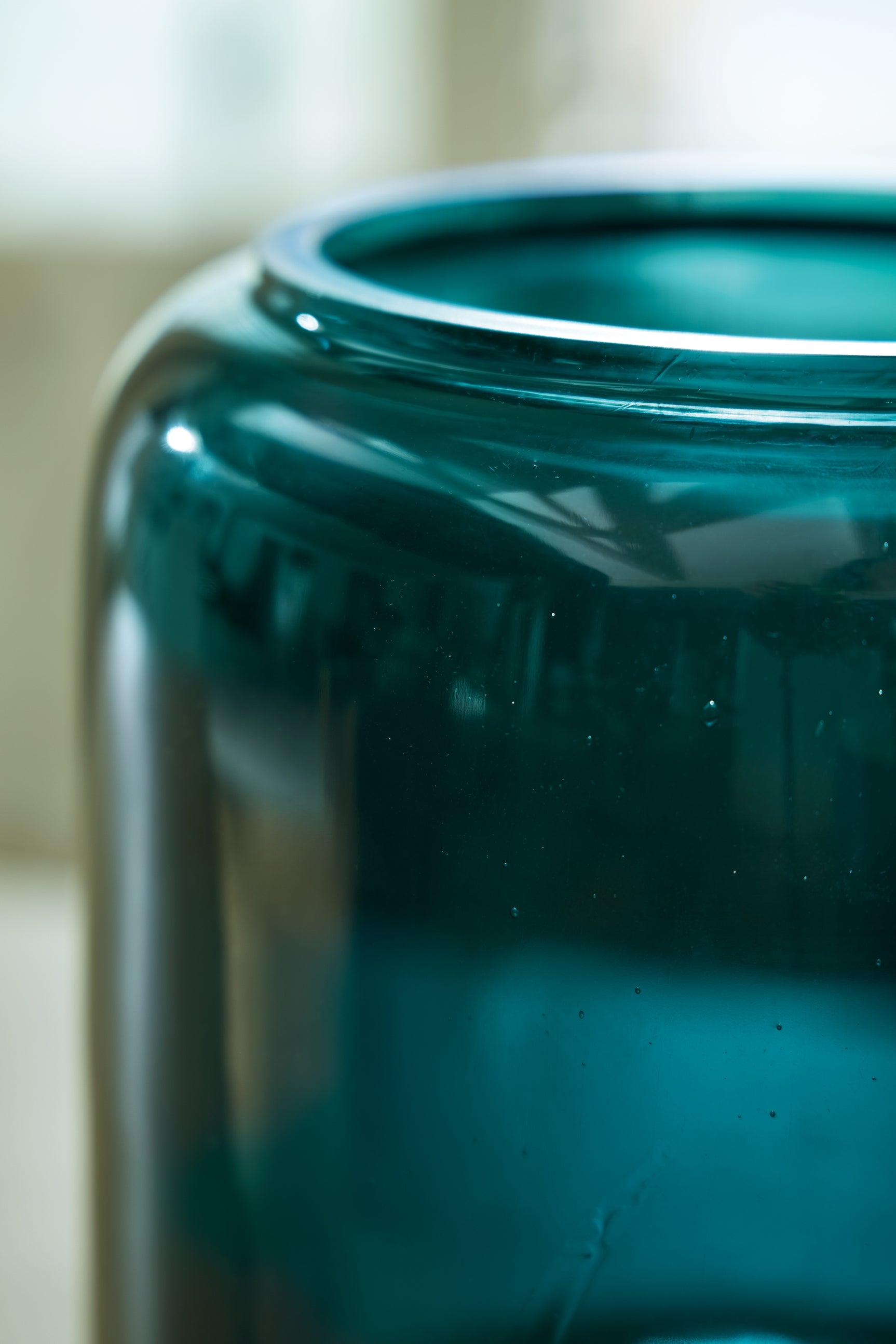 Close-up of Inisland teal vase glass texture