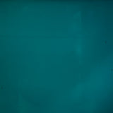 Inisland teal vase angled side view